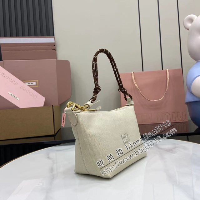 MIU MIU專櫃繆繆最新款帆布飯盒包肩背包 jh2938型號：5NE841